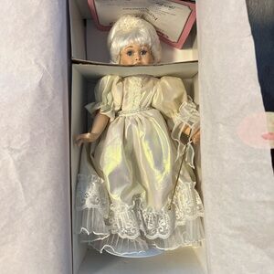 Charming porcelain Doll with Lace Dress